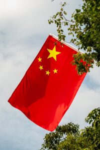 chinese national flag amidst greenery