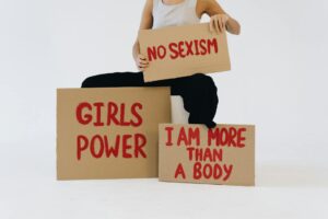 a woman showing three placards